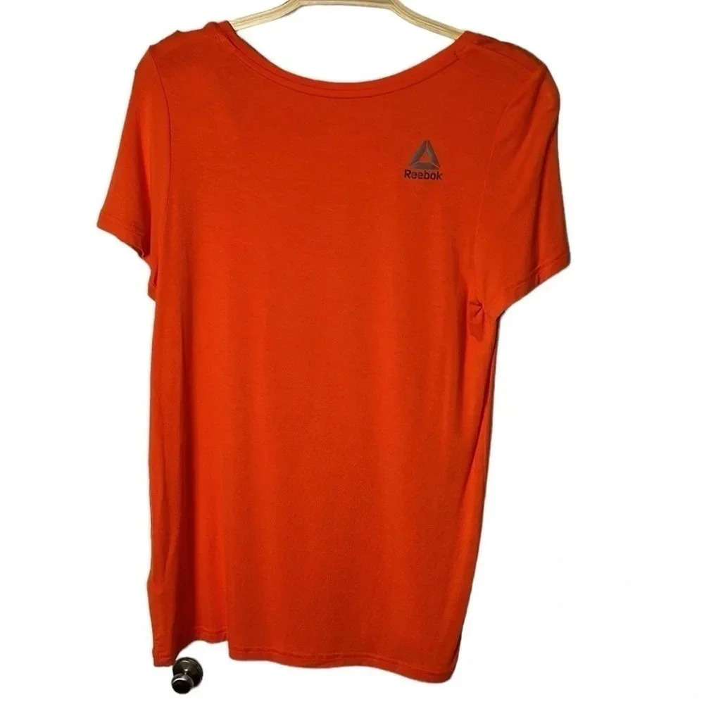 REEBOK. Orange activewear tee shirt  . Logos ,scoop neckline , longer cap sleeve - Picture 4 of 7